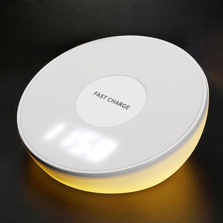 White wireless charger with digital clock display and three control buttons for mobile phones