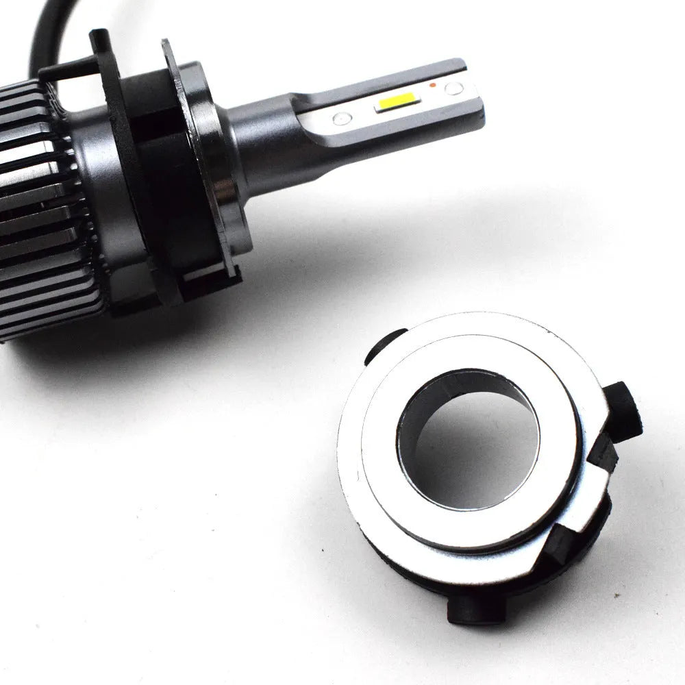 Black ABS plastic card holder for car LED headlight, shown next to a parking card.