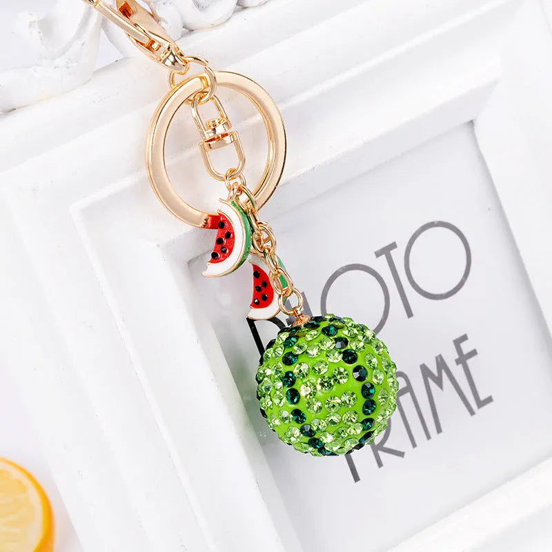 Green watermelon-shaped zinc alloy keychain measuring 12cm with keyring.