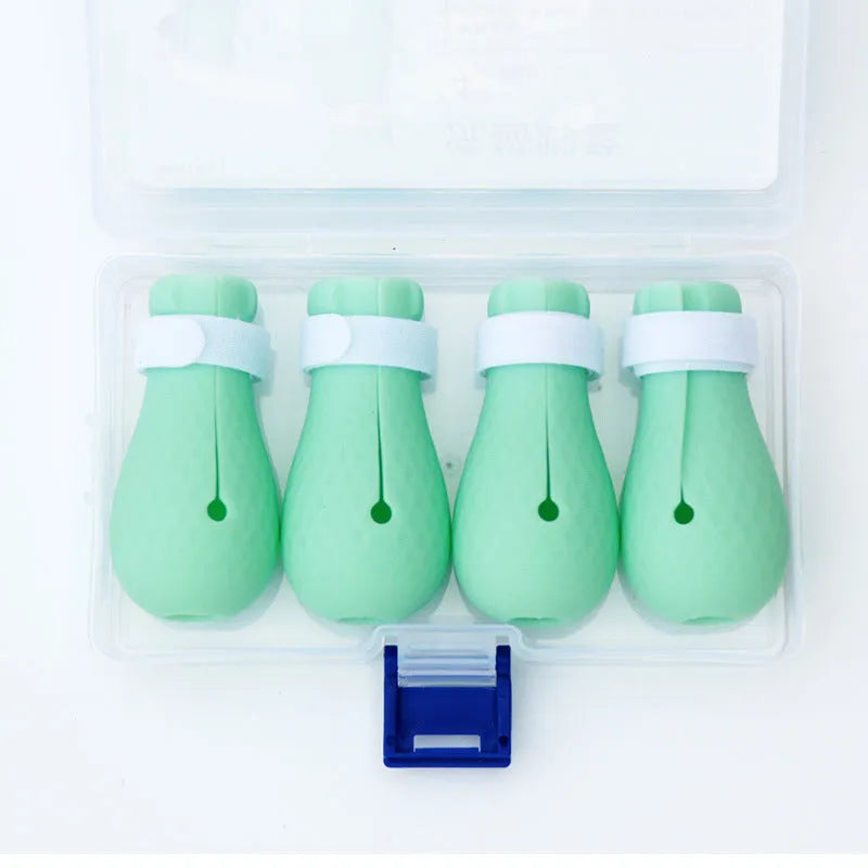 Green silicone cat anti-scratch foot covers for hand protection during pet care