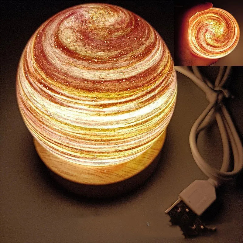 Planet-themed night light with USB cable and base, showing 80mm diameter globe