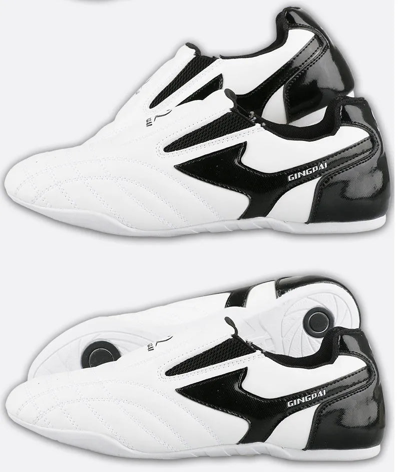 Black and white children's boxing shoes with soft bottom construction for martial arts training