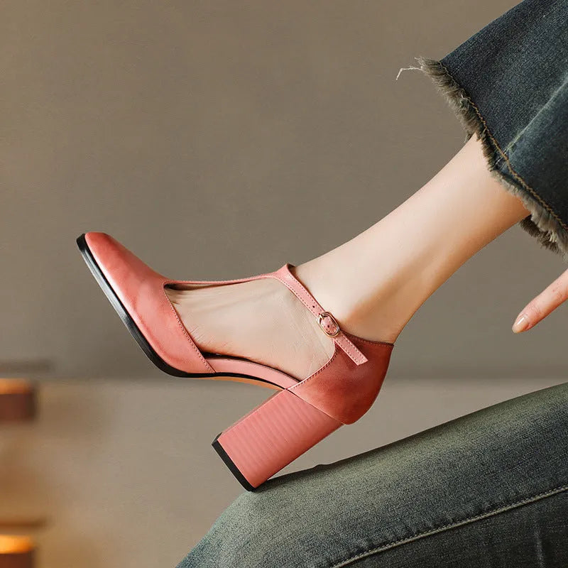 Women's dark brown retro pointed-toe Mary Jane shoes with a buckle fastening on a leather upper.
