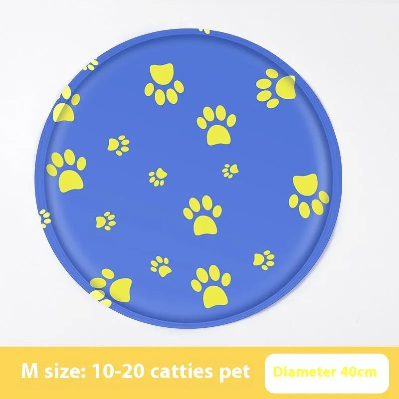 Round cartoon-design pet cooling mat for dogs on a floor, showing beige and blue colour options.
