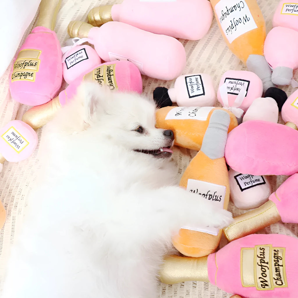 Plush wine bottle shaped dog toy in assorted colours including green, orange, red, black, coffee and white