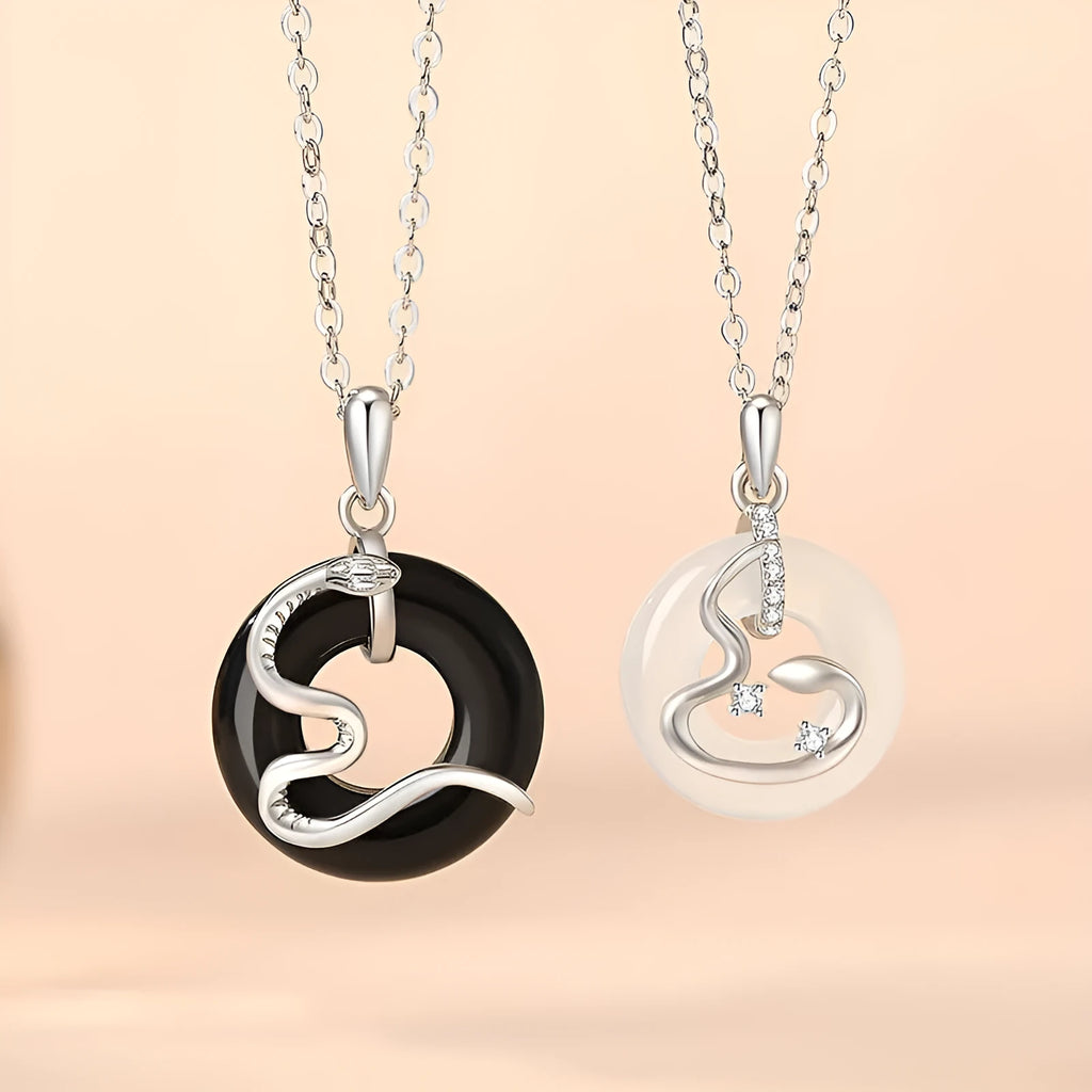 925 sterling silver snake couple necklace with Peace buckle on black background