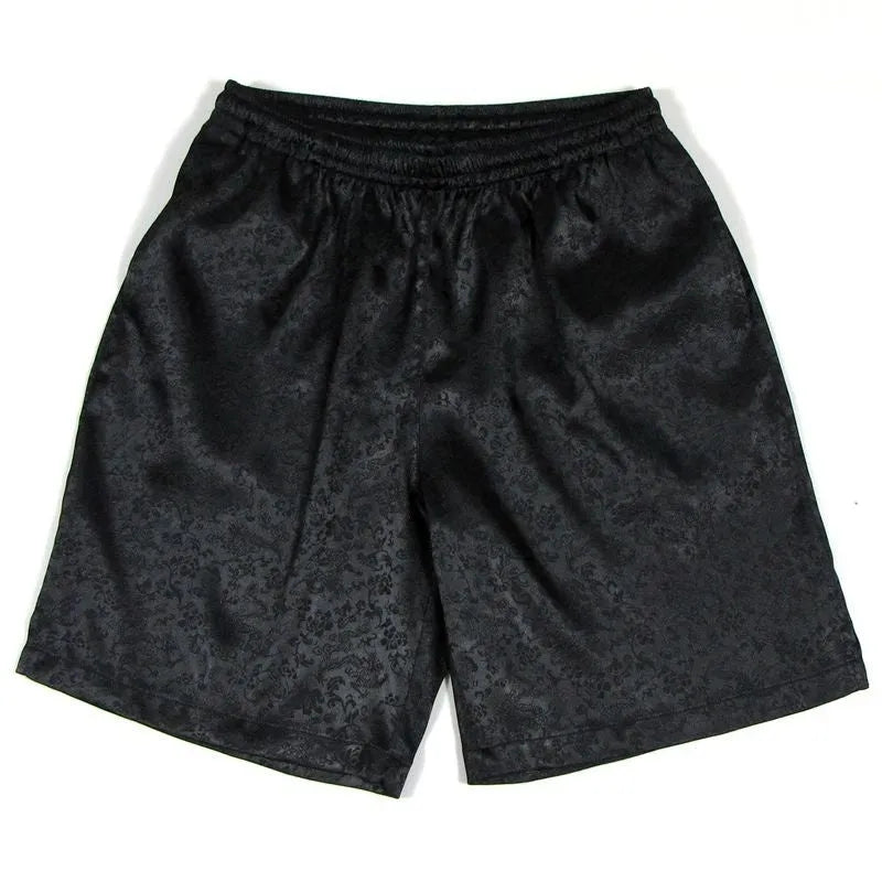 Men's black Tang suit style shorts with a loose fit and elasticated drawstring waistband.
