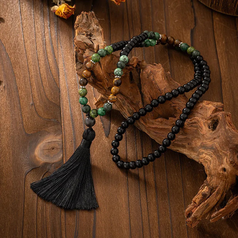 Vintage bohemian style beaded sweater chain with tassel detail and matching bracelet