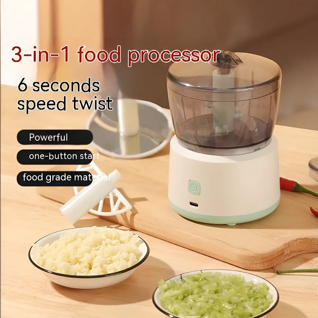 White and light green mini electric meat grinder with transparent cup and stainless steel blades
