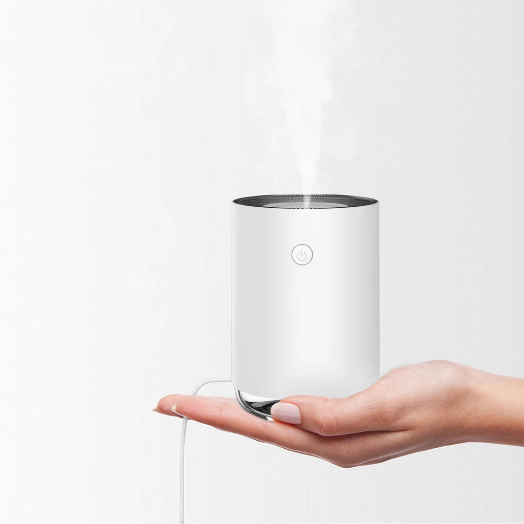 Night light humidifier spray diffuser in green colour with ABS PP build and compact design for home decor