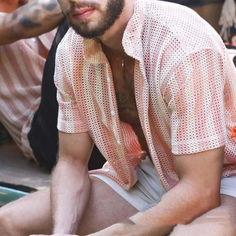 Pink men's loose-fit waffle texture short-sleeve casual shirt on a hanger