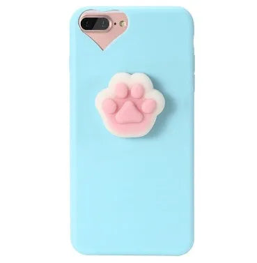 Soft silicone TPU iPhone case with a raised 3D cartoon cat design, shown in various colours.