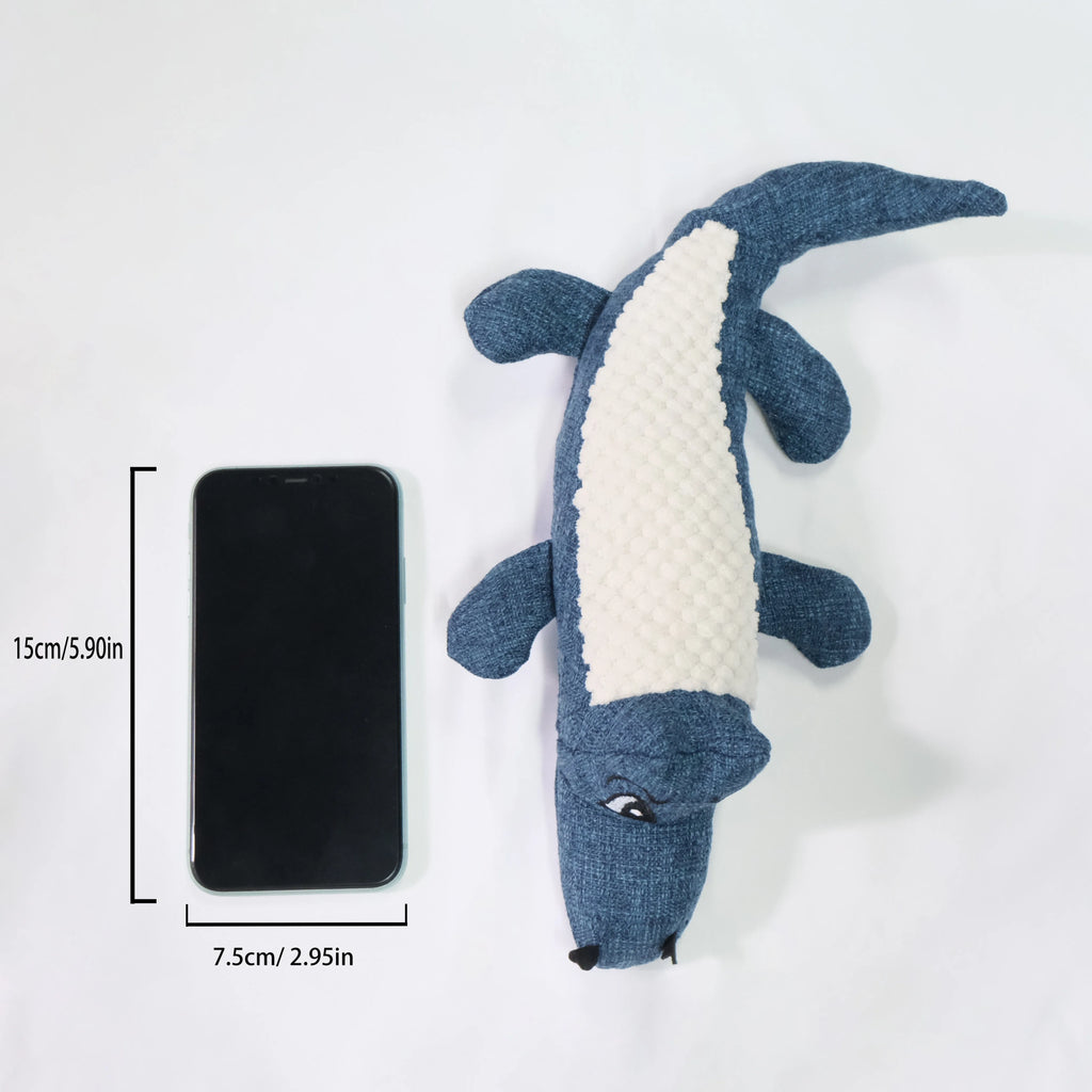 Blue, green, and red plush pet toys with corn grid texture and biting sound feature