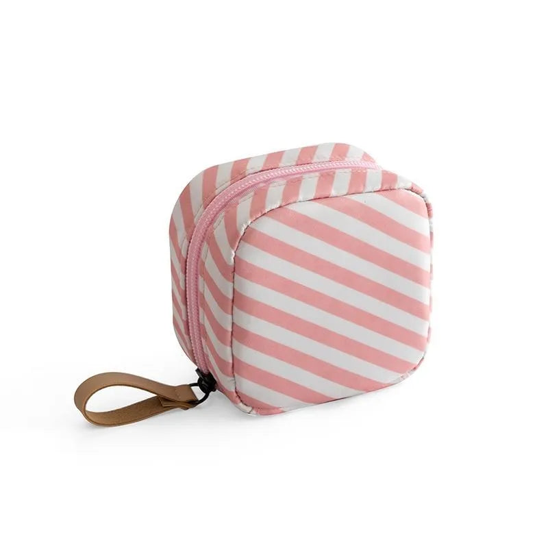 Cloth cube makeup storage bag in a choice of blue, pink, white or white pink colours.
