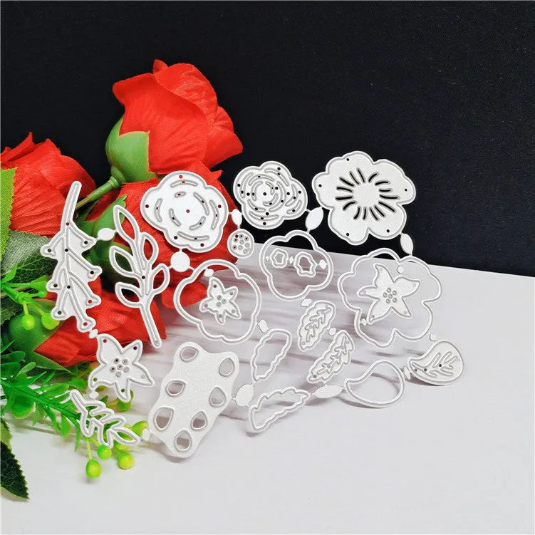 Silver carbon steel flower-shaped cutting mould measuring 14.3 by 9.9 centimetres