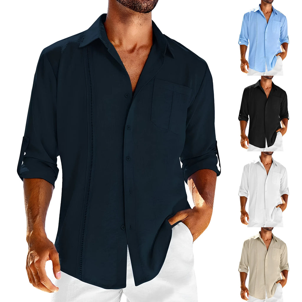 A man wearing a solid colour long sleeve shirt with a button-up polo collar and a chest pocket.