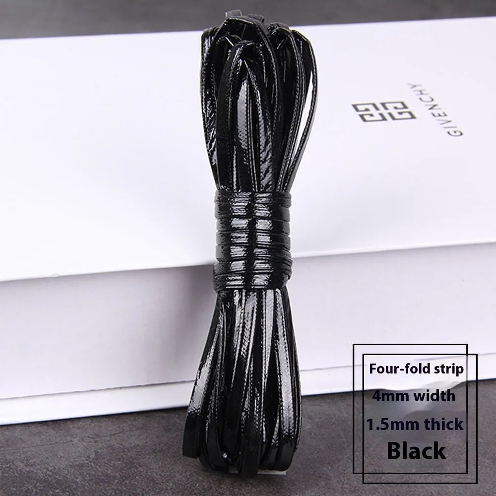 Coils of PU leather craft cord in multiple colours including black, red, blue, and beige