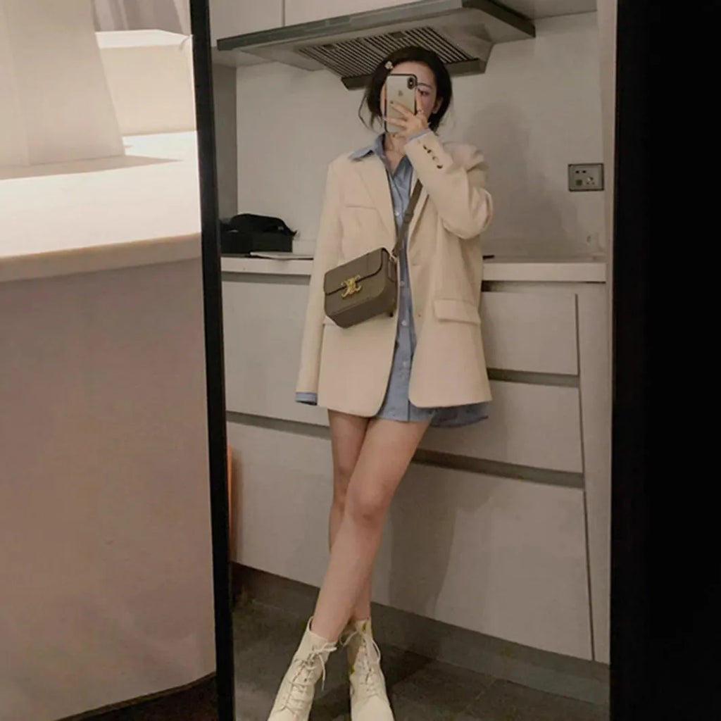 Korean style solid colour polyester blazer jacket with long sleeves and a pocket.
