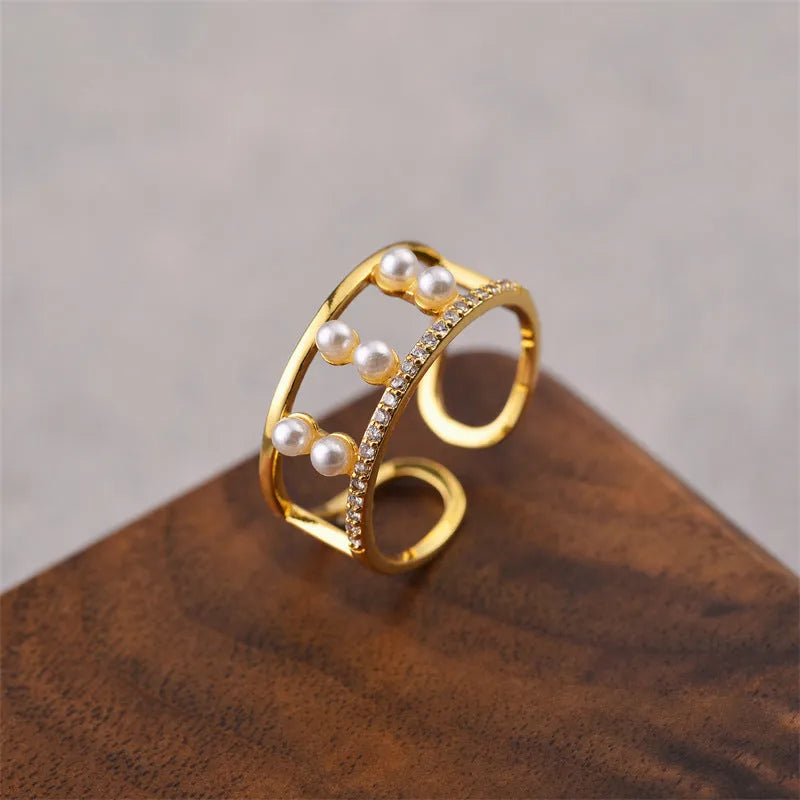 Korean women's open geometric ring with electroplated gold finish on copper