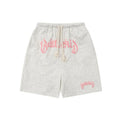 Loose fit cropped sweatpants in cotton-blended fabric on hanger, showing street style design