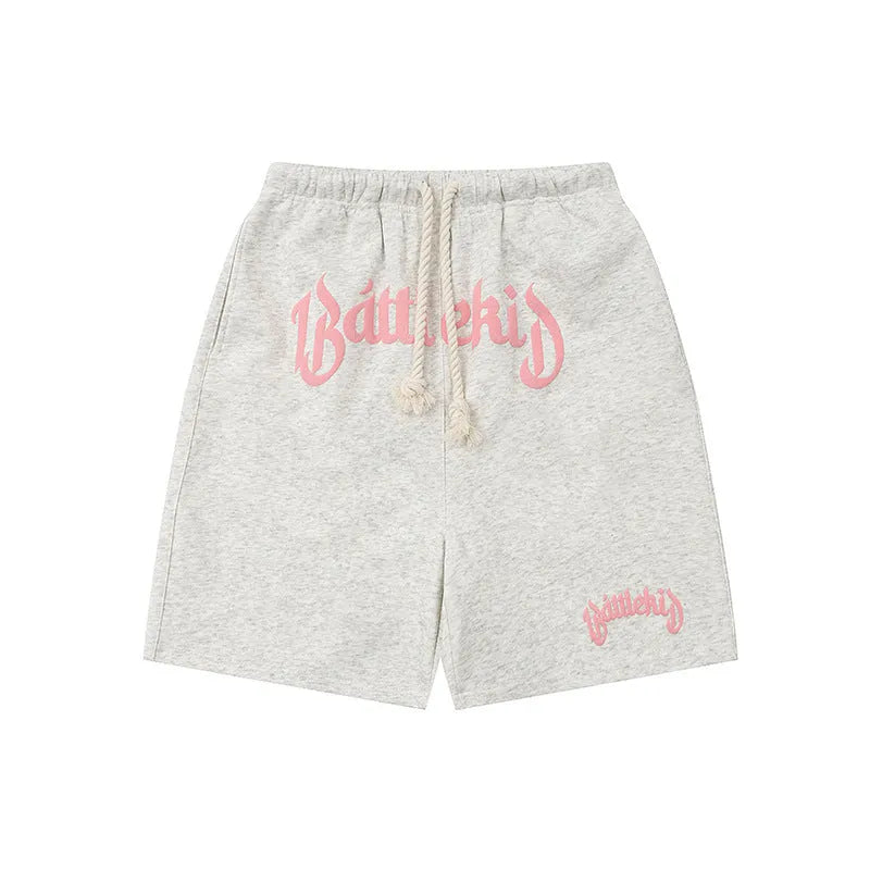 Loose fit cropped sweatpants in cotton-blended fabric on hanger, showing street style design