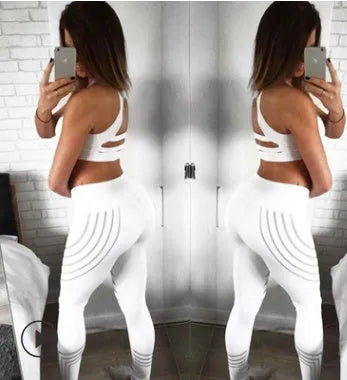 Women's high-waist workout leggings with glowing night print in black and white colours
