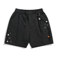 Men's black loose-fit straight-leg shorts with a semi-elastic waistband and zipper fly.