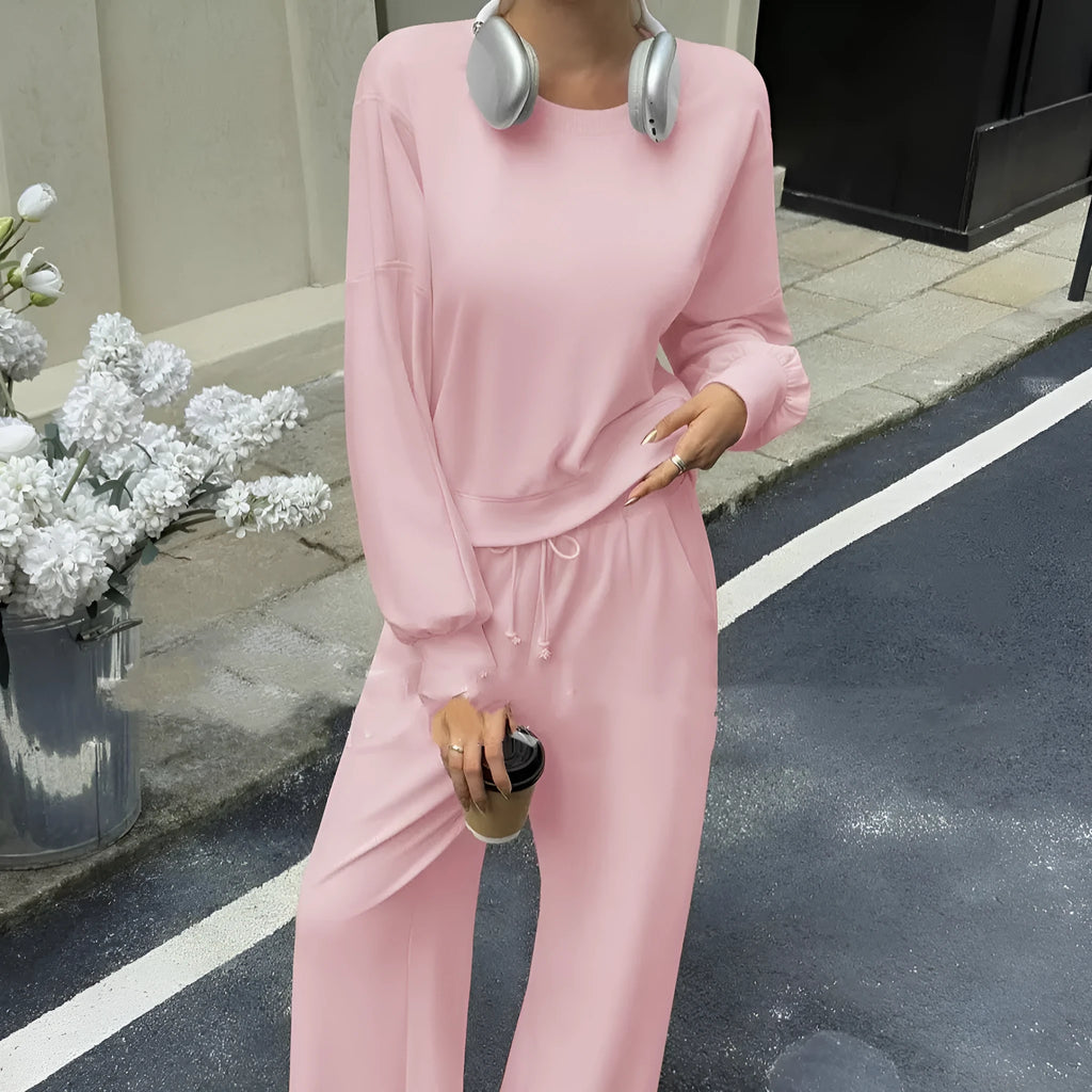 Women's solid colour polyester long sleeve top and trouser two-piece set in street hipster style.