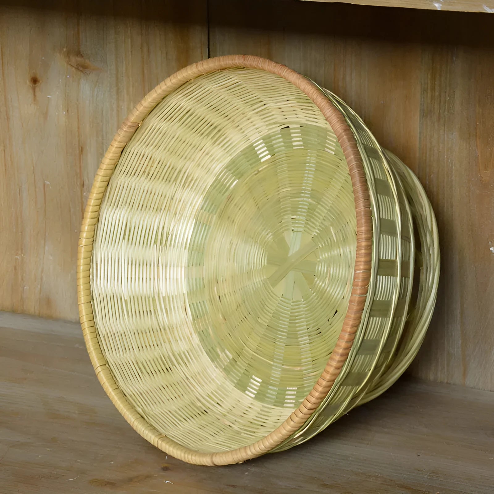 Handmade woven bamboo storage basket with rectangular shape and natural texture
