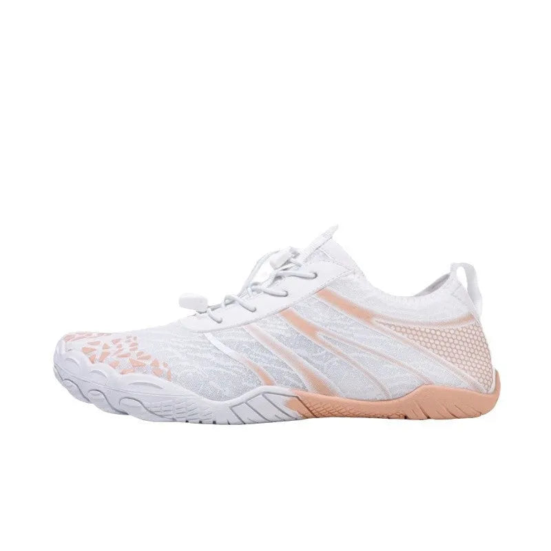 Pair of casual unisex running shoes with Lycra stretch fabric upper, shown in beige colour.