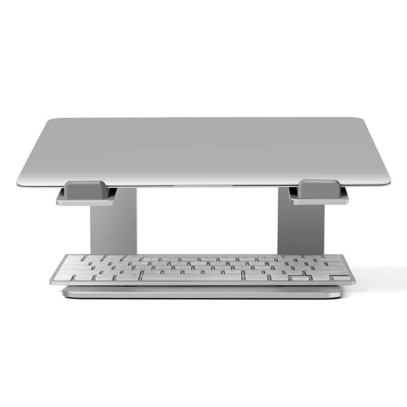 Black aluminium alloy laptop stand on a desk, elevating a silver laptop.