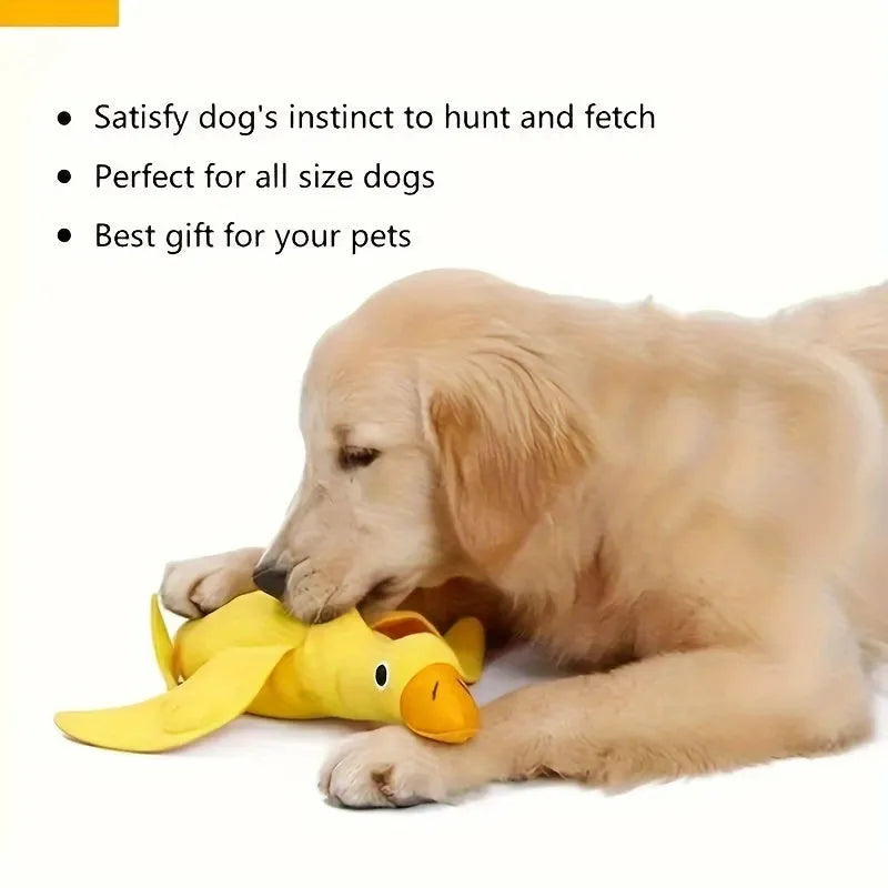 Yellow plush duck dog toy with a sound module and treat-dispensing openings.