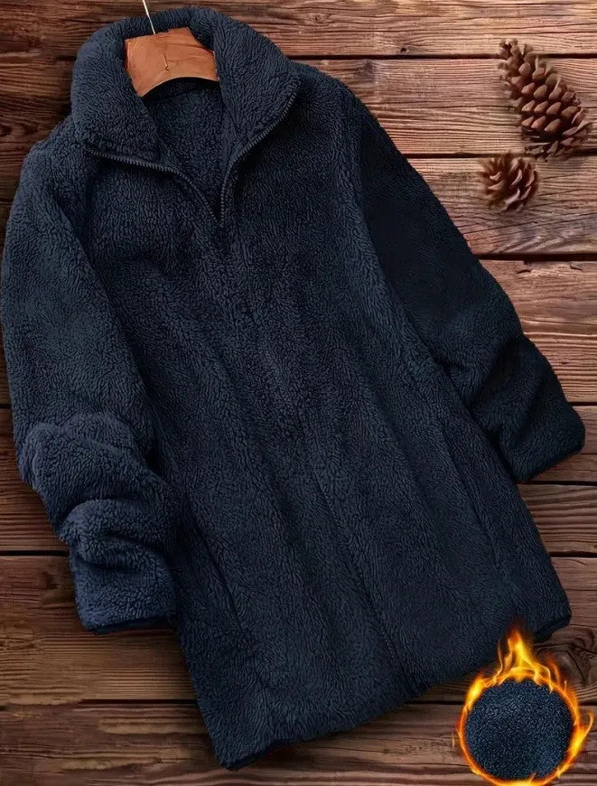 Double-sided fleece jacket in black, navy blue, or khaki colour on a hanger.