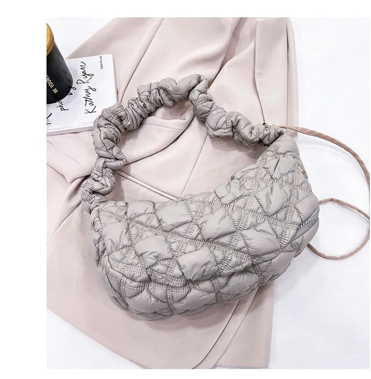 Women's nylon shoulder messenger bag in beige colour showing dimensions and adjustable strap