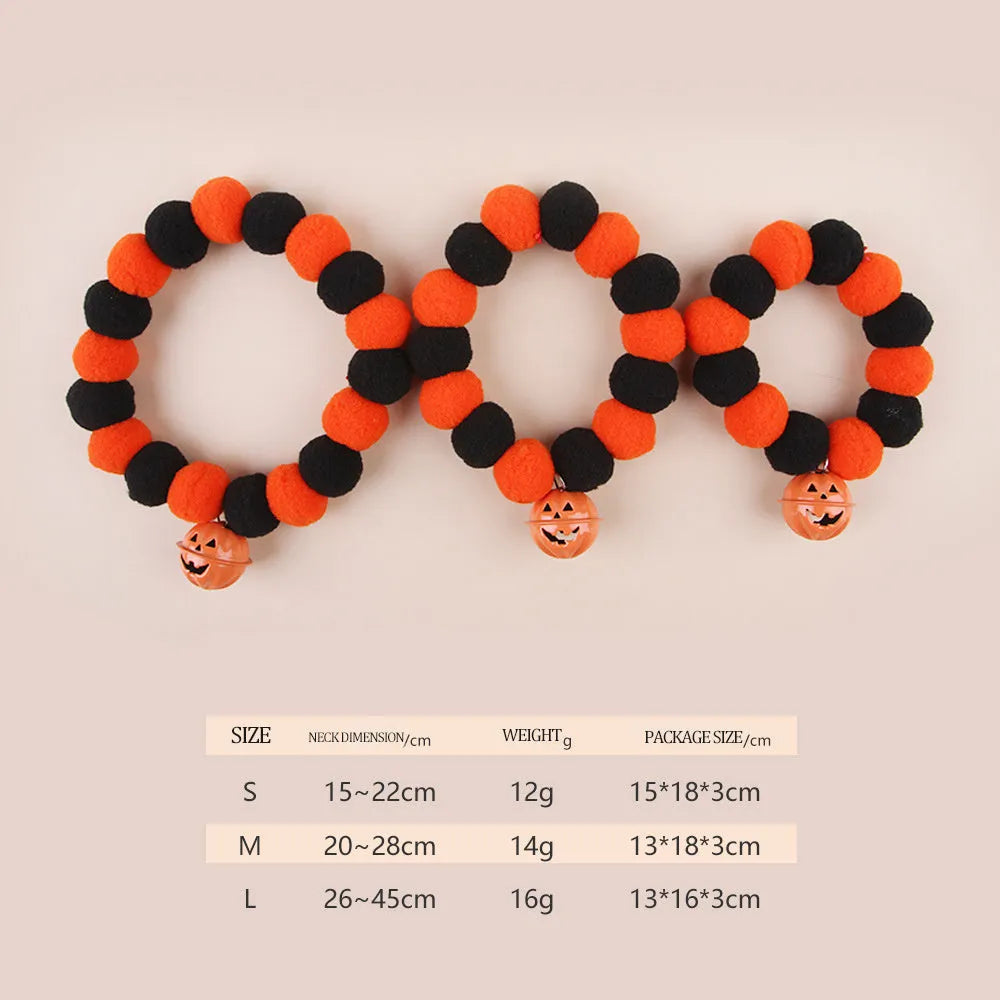 Orange Halloween pumpkin motif cat collar with an adjustable buckle fastener.