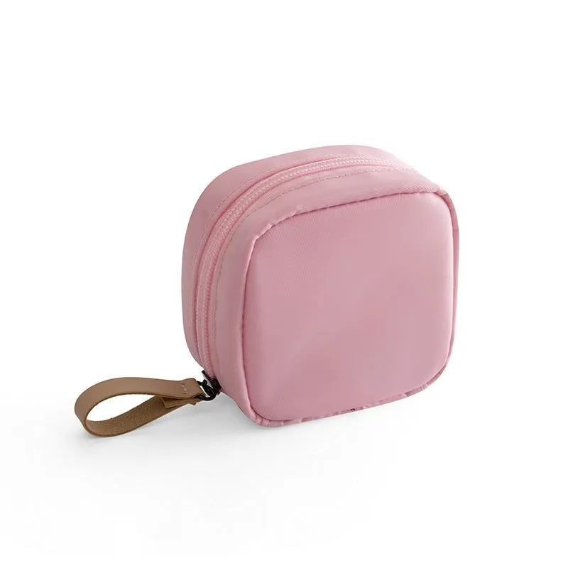 Cloth cube makeup storage bag in a choice of blue, pink, white or white pink colours.