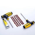 Yellow and black vacuum tire repair tool kit with probe, strips, and glue for motorcycles and cars