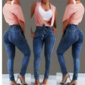 Women's fringed jeans in dark blue denim with frayed hem detailing, size chart displayed