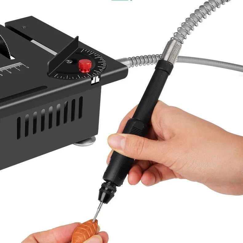 Lithium ion battery-powered metal desktop saw and angle grinder tool kit on a workbench.