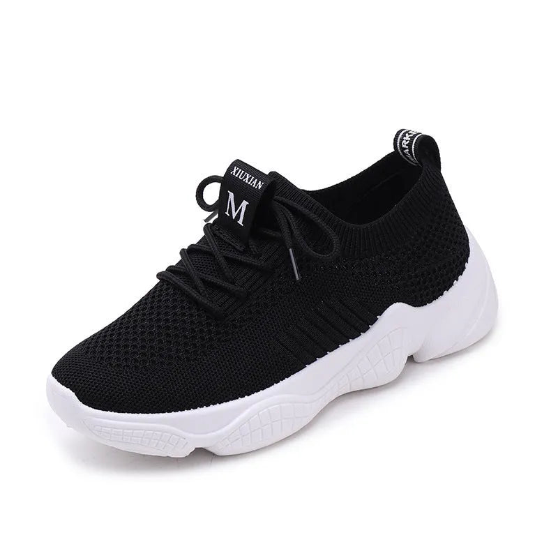 White women's thick-soled flying woven sports shoes with a front strap and rubber sole.