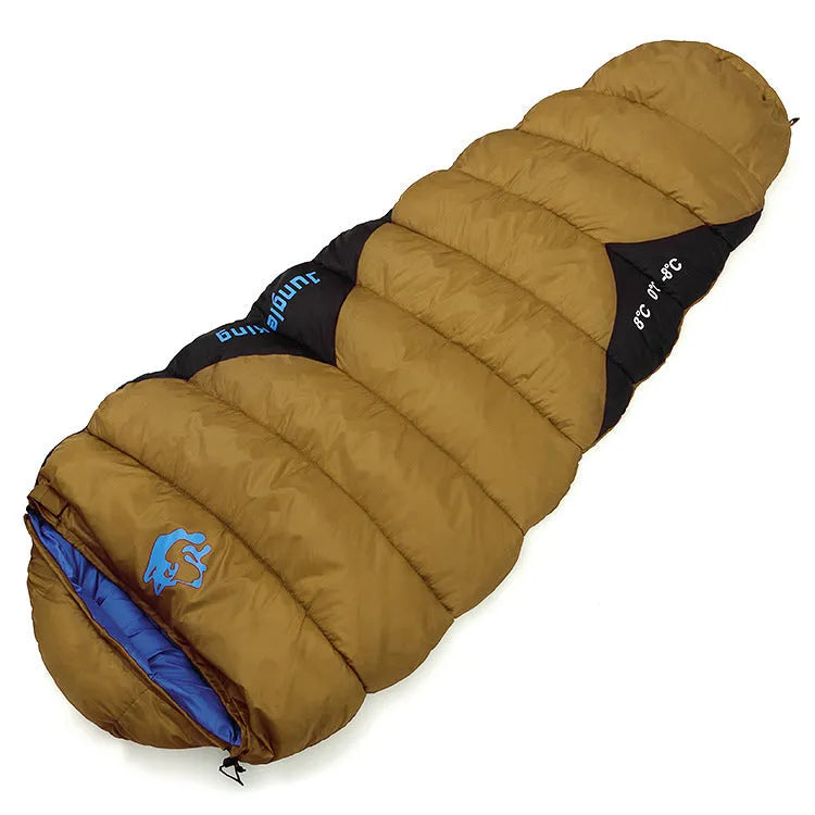 Outdoor cotton sleeping bag in army green, shown next to its grey compression storage sack