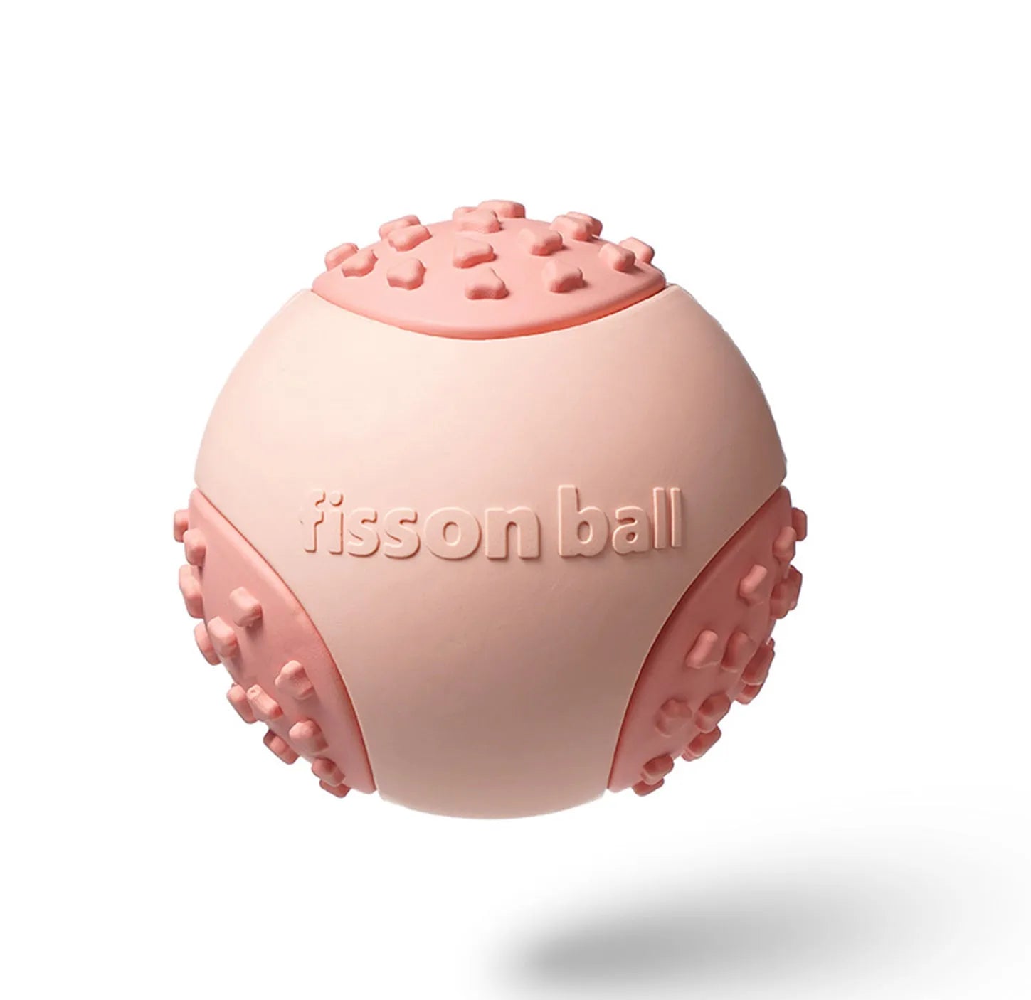 Green rolling ball dog toy on wooden floor showing 64mm diameter