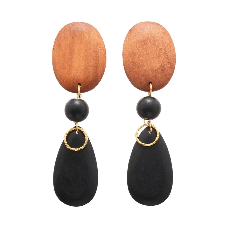 Brown-black wooden earrings with silver needle accents in elliptical European style design