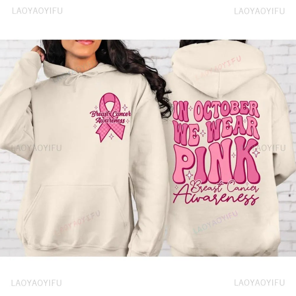 Breast cancer awareness hoodie with retro art pattern and side seam pockets in pink colour.