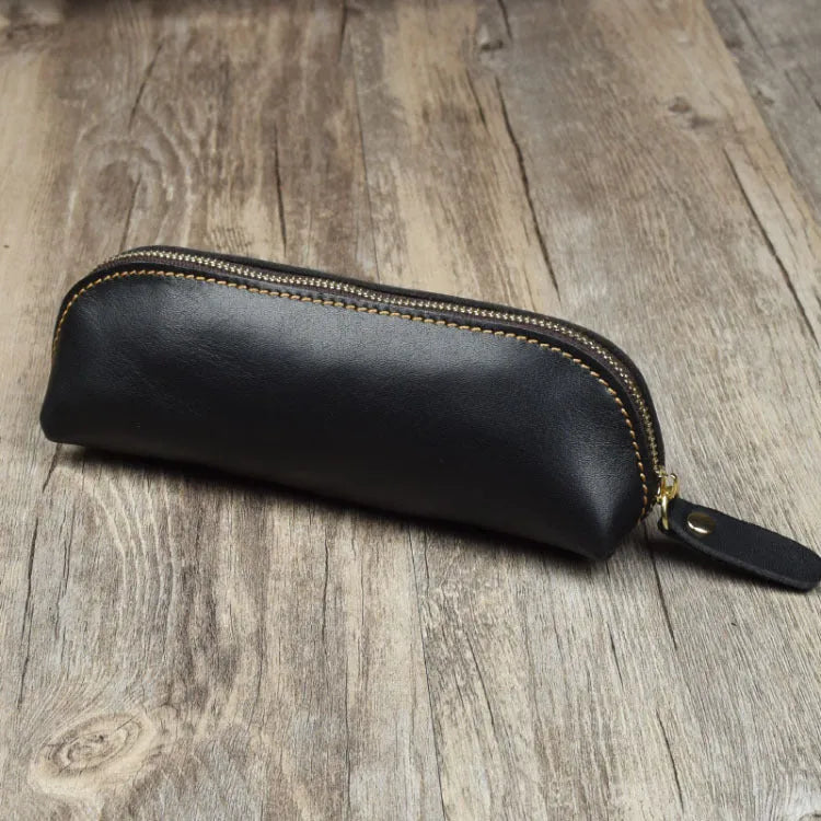 Handmade square leather pencil and glasses case with zipper, shown in black colour.