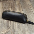 Handmade square leather pencil and glasses case with zipper, shown in black colour.