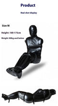Black patent leather bondage set with leak nostril clothing and six ratchet tie down straps