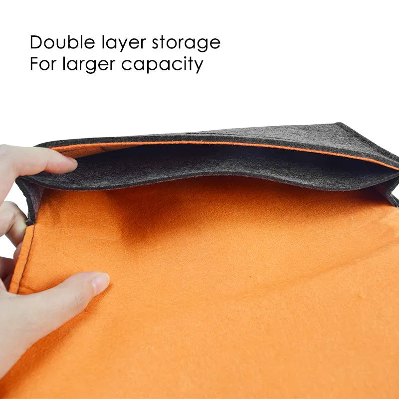 Black felt Nintendo Switch pouch case with double-layer design and game card storage slots