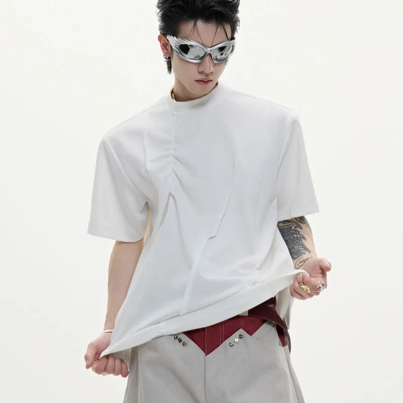 Men's loose fit cotton T-shirt with pleated detail and asymmetric stitching on a round neck, in solid black colour.