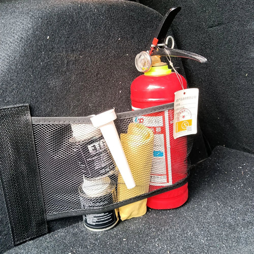 Elastic polyester car boot storage net shown holding shopping bags, available in 20x45cm or 20x35cm sizes.